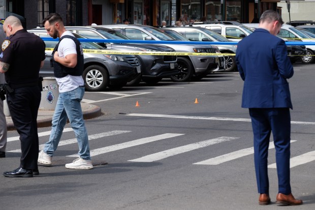 Police investigate after a 7-month-old baby girl in a stroller was fatally shot near Humboldt and Moore Sts. in East Williamsburg, Brooklyn, on Wednesday, April 1, 2026. (Gardiner Anderson / New York Daily News)