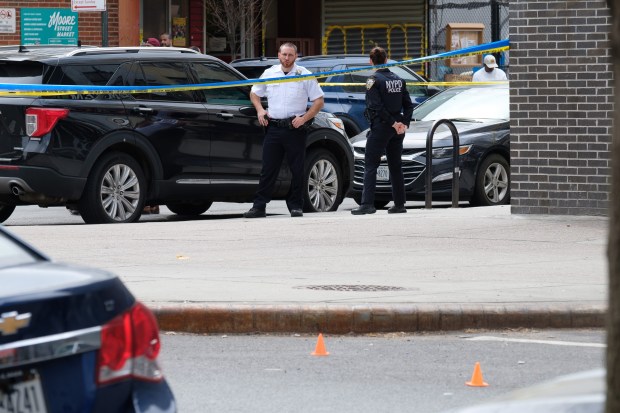 Police investigate after a 7-month-old baby girl in a stroller was fatally shot near Humboldt and Moore Sts. in East Williamsburg, Brooklyn, on Wednesday, April 1, 2026. (Gardiner Anderson / New York Daily News)