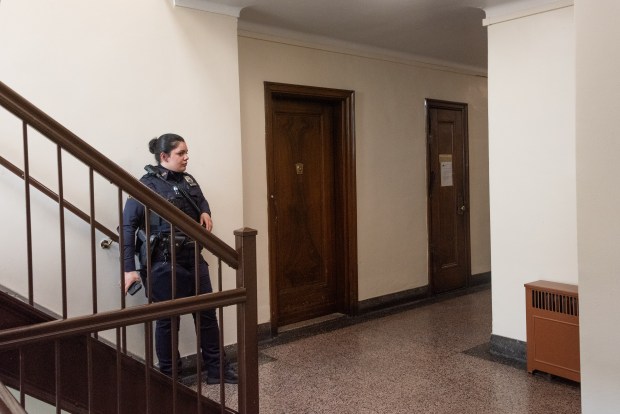 Police secure the crime scene in an apartment building on 84th St. in Jackson Heights, Queens, after two bodies were found inside an apartment on Wednesday, April 1, 2026. (Gardiner Anderson / New York Daily News)