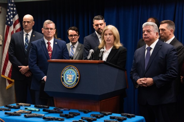 NYPD Commissioner Jessica Tisch and Brooklyn District Attorney Eric Gonzalez, right, announce a gang takedown at the Kings County DA's Office in Brooklyn, New York on Wednesday, April 15, 2026. (Gardiner Anderson / New York Daily News)