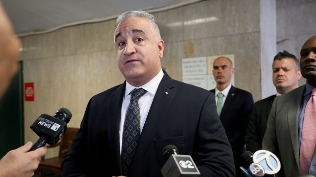 Vincent Vallelong, president of the NYPD Seargents Benevolent Association, speaks outside court after the arraignment of Joshua Dorsett a suspected gang member with an extensive criminal sheet, accused of shooting and wounding two NYPD sergeants after robbing a woman on the Lower East Side on Friday, August 2, 2024. (Luiz C. Ribeiro for New York Daily News)