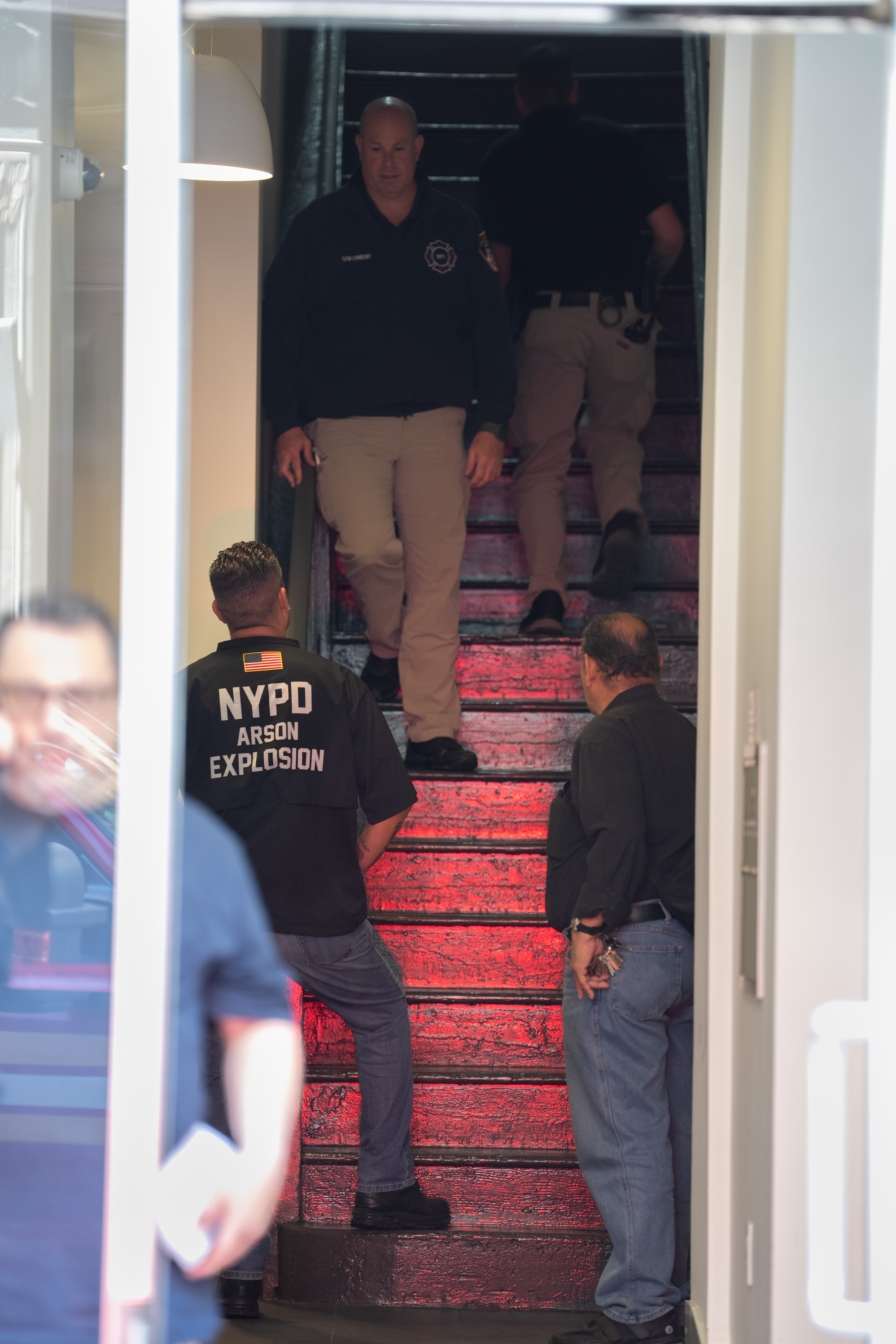 Officials investigate a fire on Murray St. Friday, April 17,...