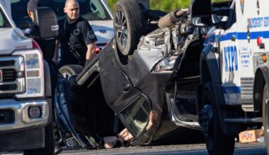 Two women hospitalized after their car crashes, overturns on BQE in Brooklyn
