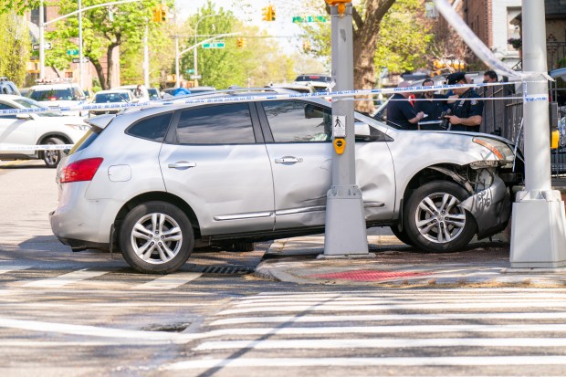 An 80-year-old man and an 87-year-old woman were struck by the driver of a 2013 Nissan while in the crosswalk at 35th Ave. and Crescent St. in Queens on Friday, April 17, 2026. (Theodore Parisienne / New York Daily News)