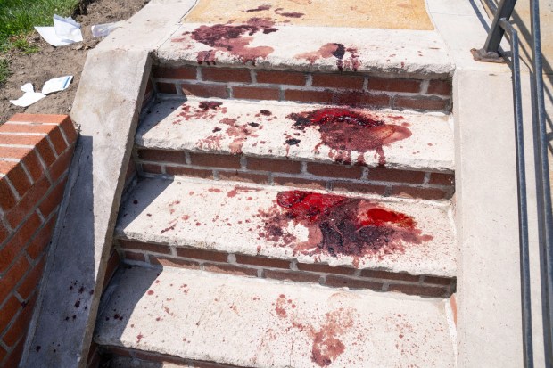 Blood is pictured after a man, allegedly enraged over a dog peeing on his lawn, stabbed multiple people on 229th St. near 141st Ave. in Queens on Thursday, April 23, 2026. (Theodore Parisienne / New York Daily News)