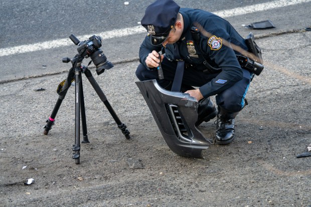 The NYPD Highway Patrol investigates after an unidentified man was killed as he tried to cross a the Bruckner Expressway in the Bronx early Saturday.