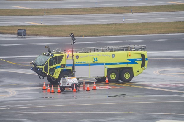 A Port Authority emergency vehicle is pictured after a different emergency vehicle collided with an Air Canada Express plane at LaGuardia Airport in Queens, New York, on Monday, March 23, 2026. (Theodore Parisienne / New York Daily News)