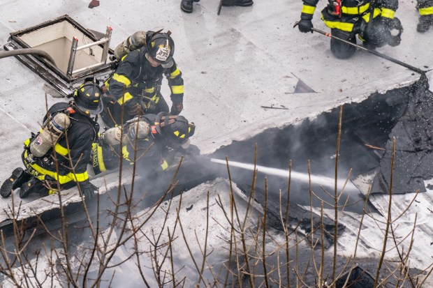 Three people were killed, including a child of unknown age, with several others suffering serious injuries, after a four-alarm fire broke out inside a two story residence at 44-49 College Point Boulevard in Queens on Monday March 16, 2026. 1309. (Theodore Parisienne / New York Daily News)