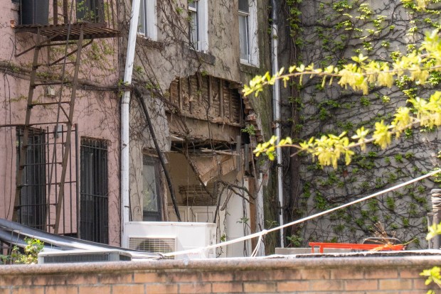 Neighbors were evacuated after a large section of the rear wall of 347 Myrtle Ave. collapsed in Brooklyn on Saturday April 18, 2026. 1229. No injuries were reported. (Theodore Parisienne / New York Daily News)