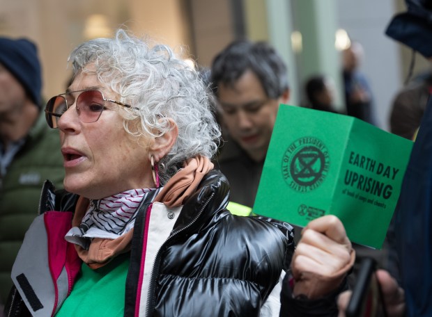 Climate activists from Extinction Rebellion protest outside Trump Tower on Wednesday, April 22, 2026, in Manhattan, New York. (Barry Williams/ New York Daily News)
