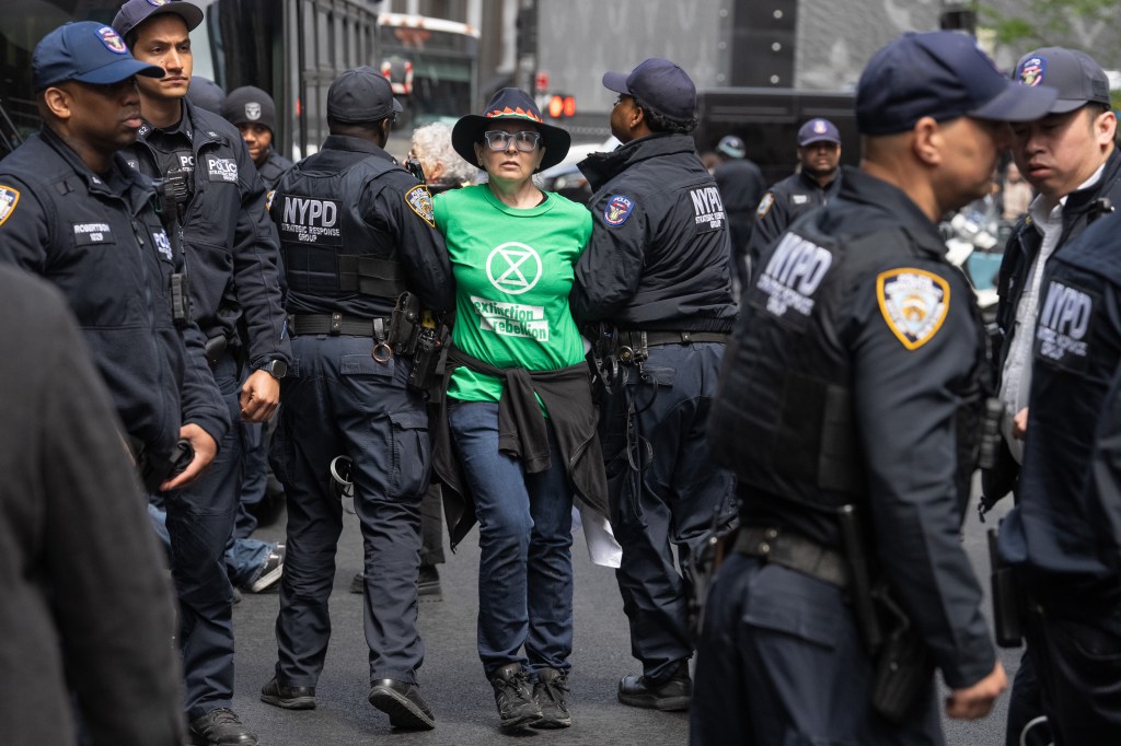 Activists arrested during Earth Day protest outside Trump Tower in Midtown