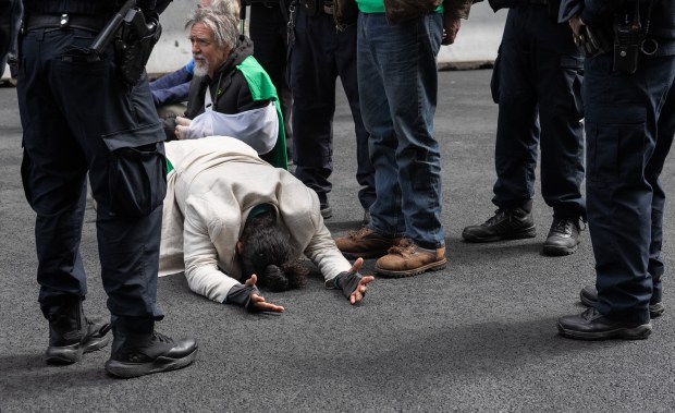Climate activists from Extinction Rebellion protest outside Trump Tower on Wednesday, April 22, 2026, in Manhattan, New York. (Barry Williams/ New York Daily News)