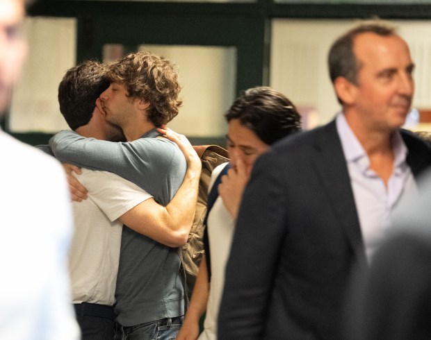 Loved ones of Nadia Vitels hug after the sentencing of Halley Tajada on Tuesday, April 14, 2026, in Manhattan, New York. (Barry Williams/ New York Daily News)