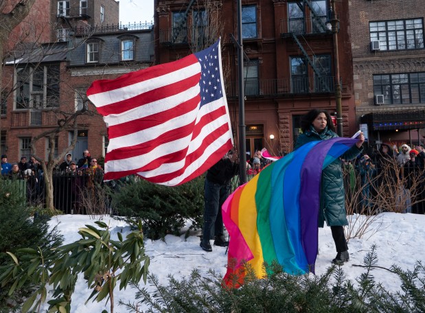 An LBGTB supporter lowers a U.S. flag to be joined with a pride flag at the Stonewall National Monument Thursday, Feb. 11, 2026 in Manhattan, New York. (Barry Williams/ New York Daily News)