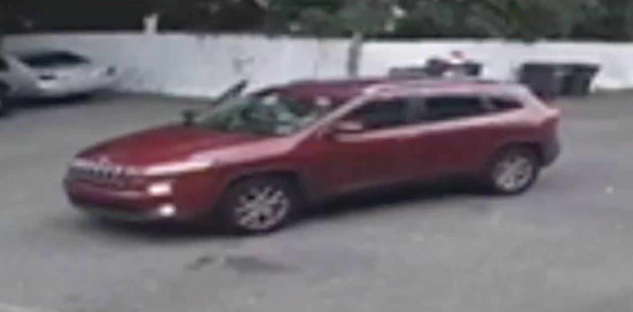 Maroon Jeep used as getaway vehicle