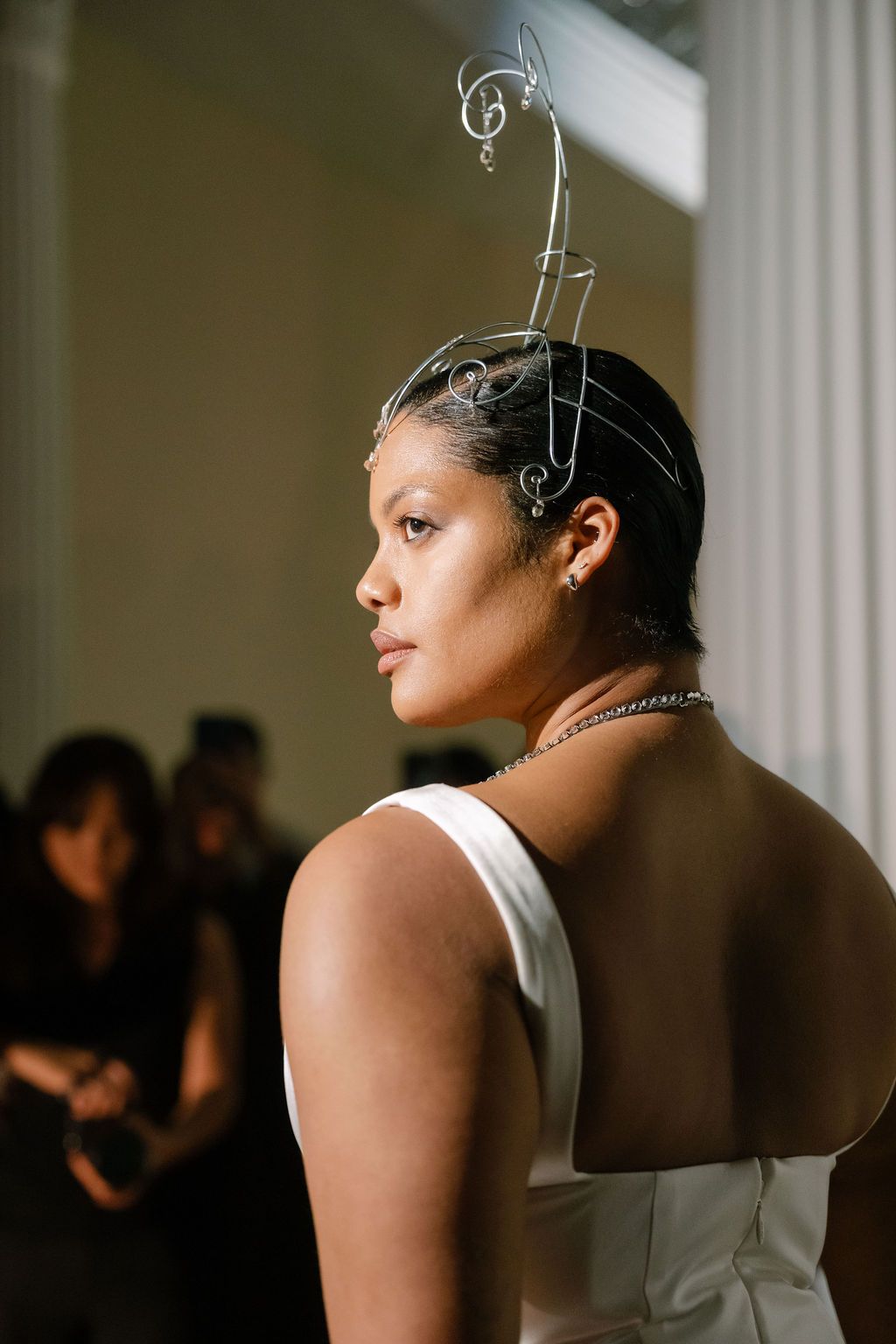 Image may contain Adult Person Body Part Shoulder Face Bridal Headpieces and Head