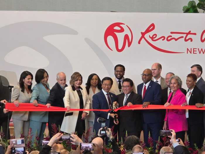 Lim cut the ribbon at Resorts World Tuesday morning. Photo by Shane O'Brien. 