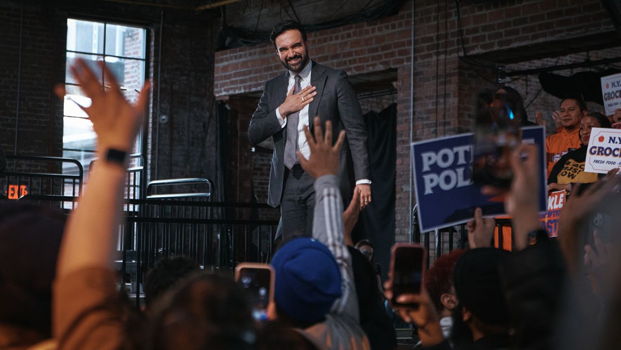 New York City Mayor Zohran Mamdani salutes his supporters during an address marking his first 100 days in office at the Knockdown Center, Sunday, April 12, 2026, in New York. (AP Photo/Andres Kudacki)