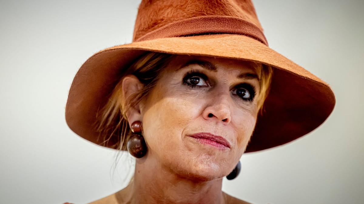 Queen Máxima skips Easter break, reviving a midi dress to highlight her showstopping accessories