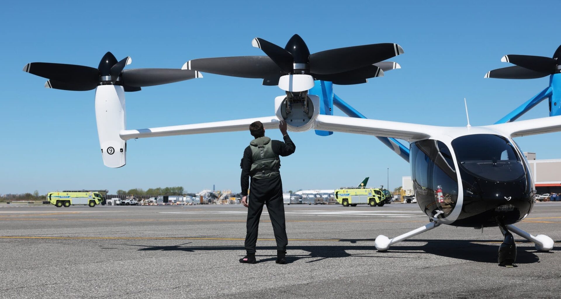 NA test pilot checks a Joby Aviation electric aircraft for take off from JFK airport.