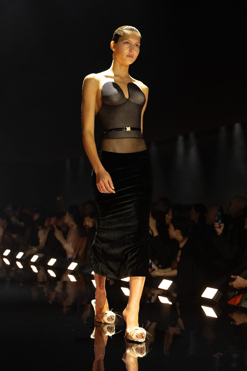 Model walking on the runway in a fashion show