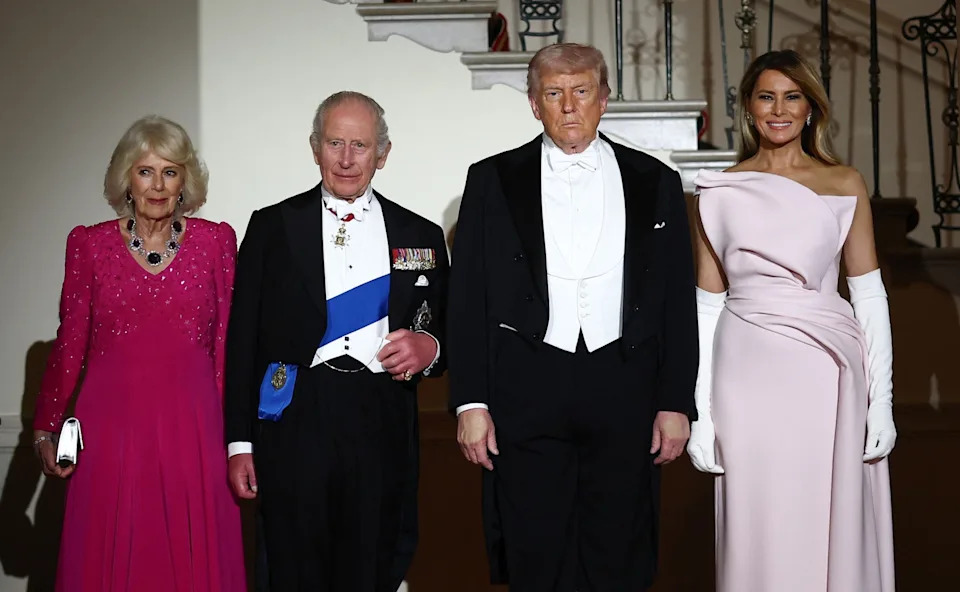 Henry Nicholls/AFP via Getty Images - PHOTO: President Donald Trump, first lady Melania Trump, Britain's King Charles and Queen Camila pose in front of the Grand Staircase prior to a state dinner at the White House in Washington, April 28, 2026.