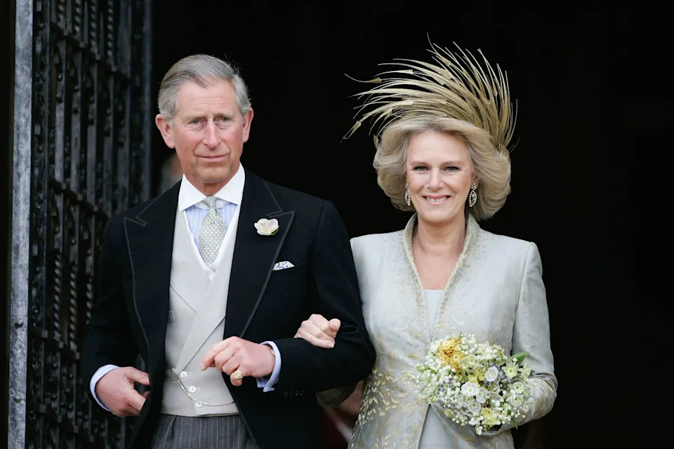 Queen Camilla and King Charles smiling on their wedding day