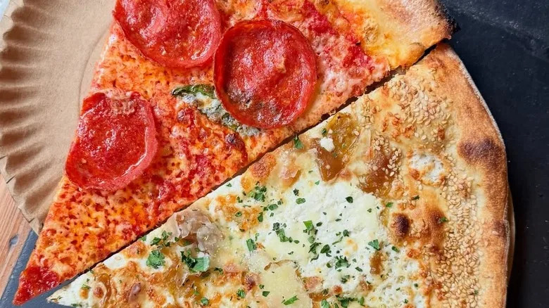 Two slices of Best Pizza: pepperoni and white cheese.