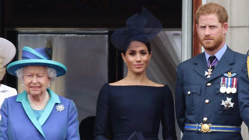 Queen Elizabeth II, Meghan Markle and Prince Harry during the 100th Anniversary of the Royal Air Force in 2018. By: Keith Mayhew/MEGA
