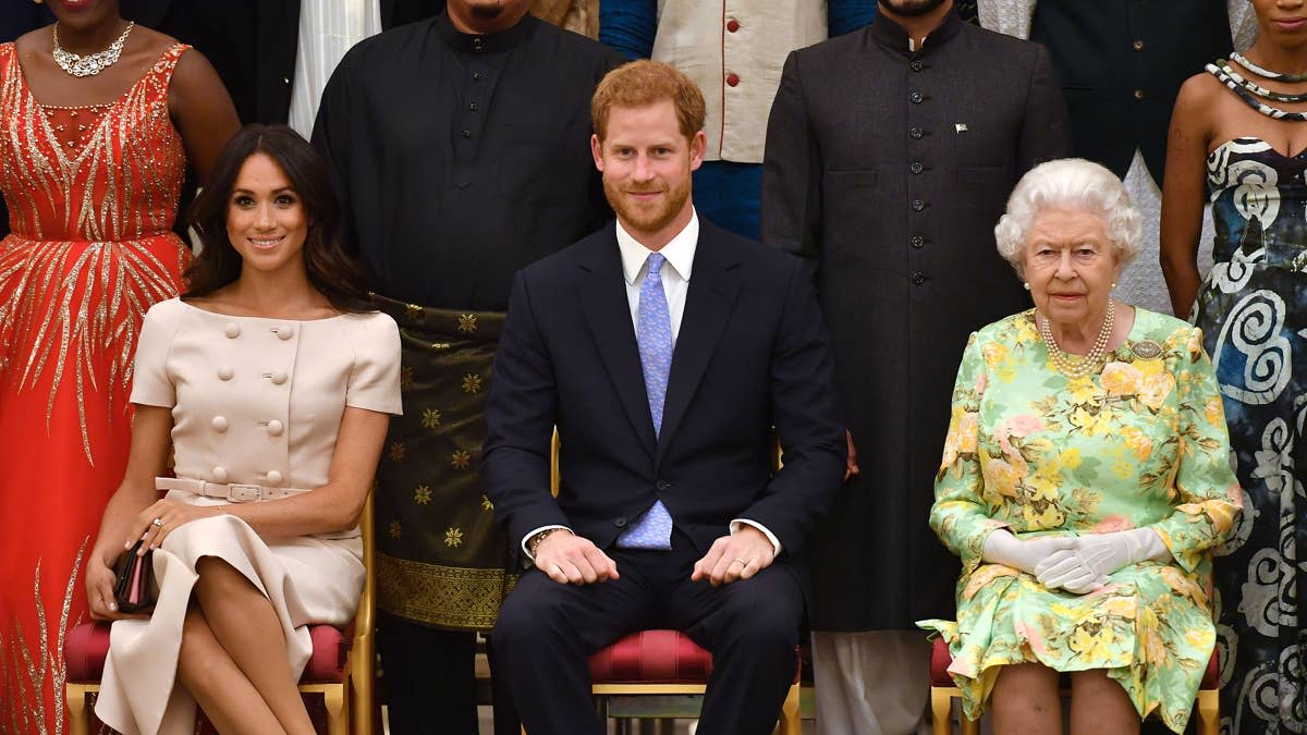 LONDON, ENGLAND - JUNE 26: Meghan, Duchess of Sussex, Prince Harry, Duke of Sussex and Queen Elizabeth II at the Queen's Young Leaders Awards Ceremony at Buckingham Palace on June 26, 2018 in London, England. The Queen's Young Leaders Programme, now in its fourth and final year, celebrates the achievements of young people from across the Commonwealth working to improve the lives of people across a diverse range of issues including supporting people living with mental health problems, access to education, promoting gender equality, food scarcity and climate change. (Photo by John Stillwell - WPA Pool/Getty Images)John Stillwell - WPA Pool&sol;Getty Images