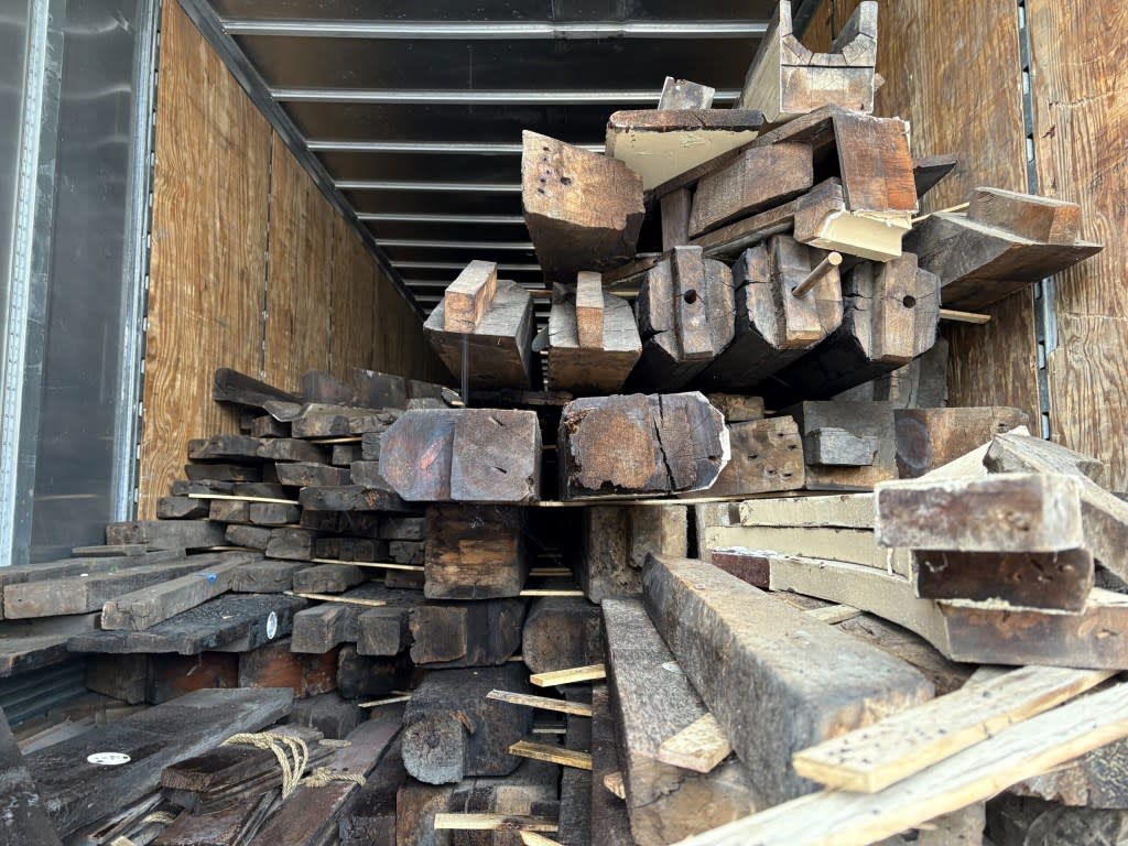 Today, the remnants of the Carpenter Gothic-style Episcopal Church remain disassembled but mostly intact, stored in a pair of trailers parked along grounds at All Faiths Cemetery in Middle Village. New York Landmarks Conservancy