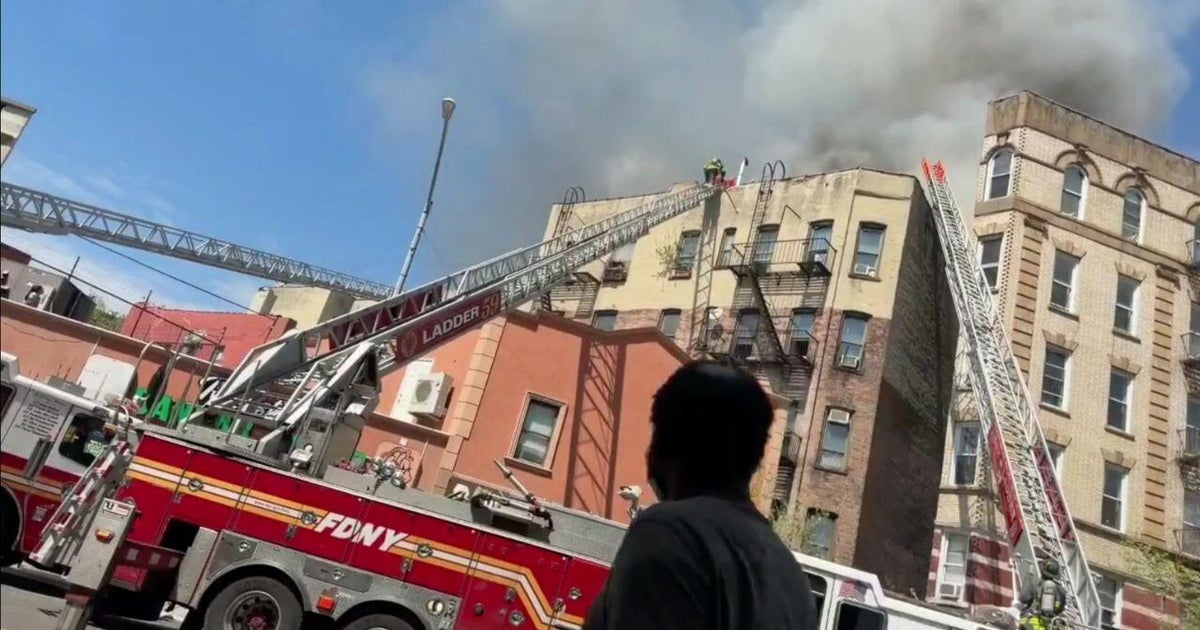 At least 1 dead in 4-alarm building fire in Belmont section of the Bronx
