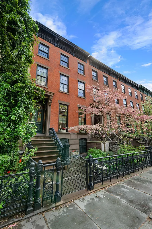 exterior of a red brick row house