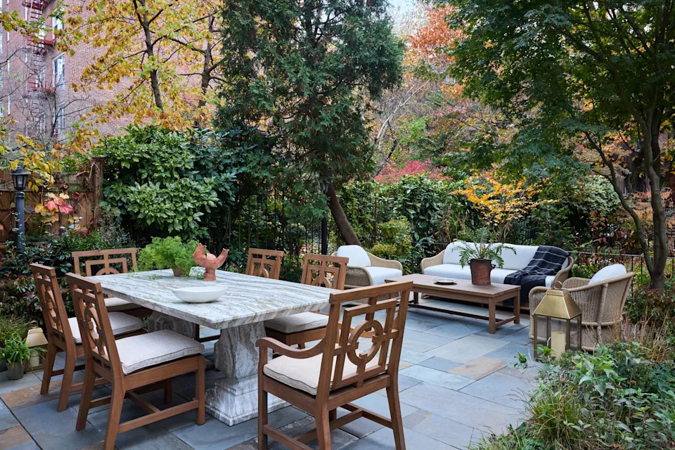 The backyard, landscaped by Outside Space NYC, is set up for entertaining with Arhaus furniture and regularly hosts gatherings. “At least three or four of my friends have spare keys and tend to let themselves in when they know I'm home,” Weed says. “It's the Sesame Street vibe that I think we all come to crave in New York.” One party even took on a Grey Gardens theme, perfectly in keeping with her vision. She plans to add “crumbly” antique mirrors, “Secret Garden–style,” to make the wisteria-draped yard feel more layered and lived-in.
