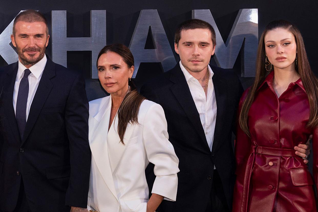 David and Victoria Beckham with their eldest son Brooklyn and his wife Nicola Peltz in 2023. (Vianney Le Caer / Invision / AP file)