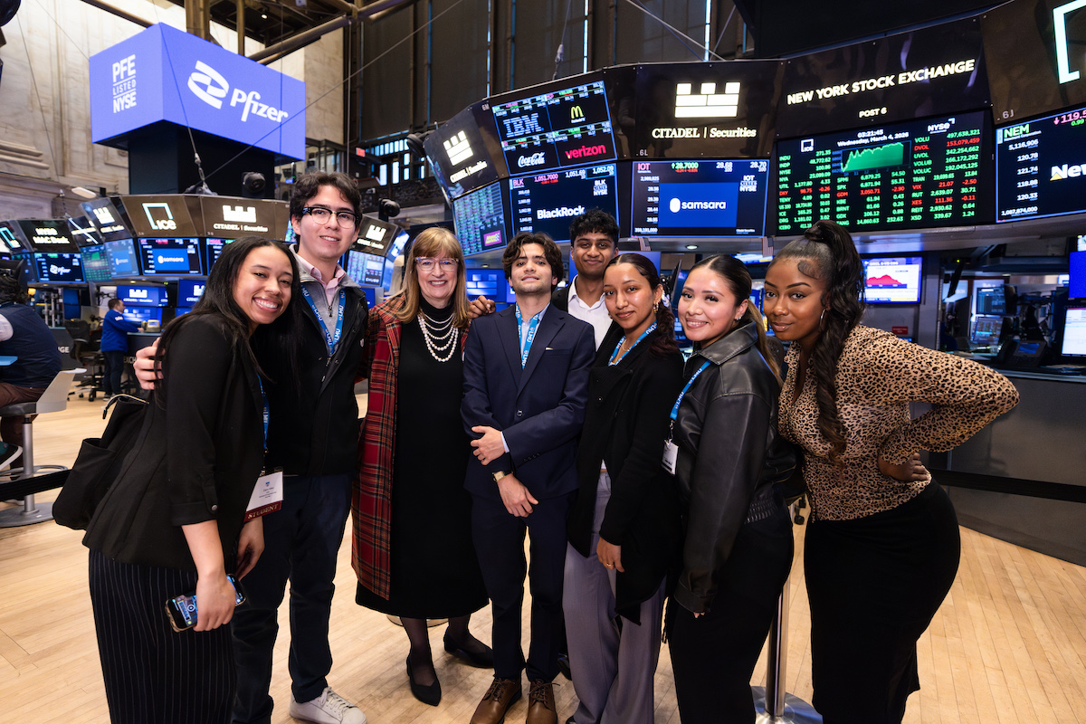 LMU students and CBA Dean Dayle Smith pictured at New York Stock Exchange