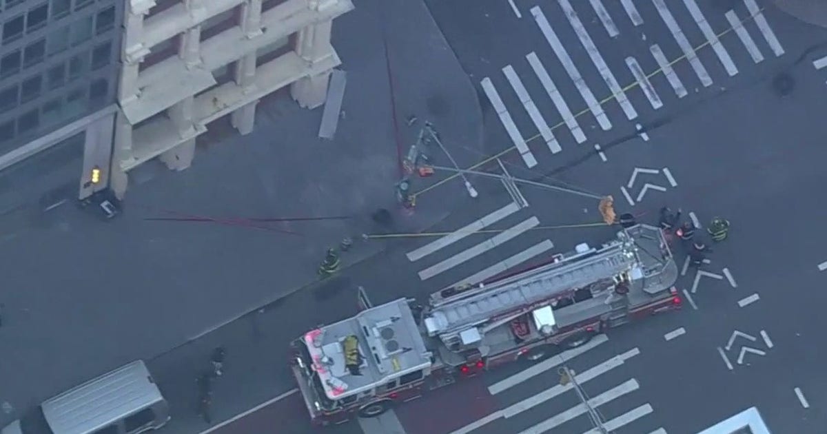 Building facade collapses in Lower Manhattan during morning commute
