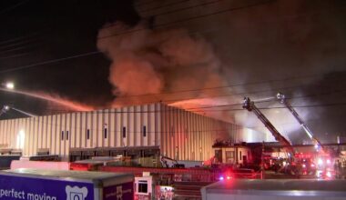 Crews battle massive factory fire in Queens