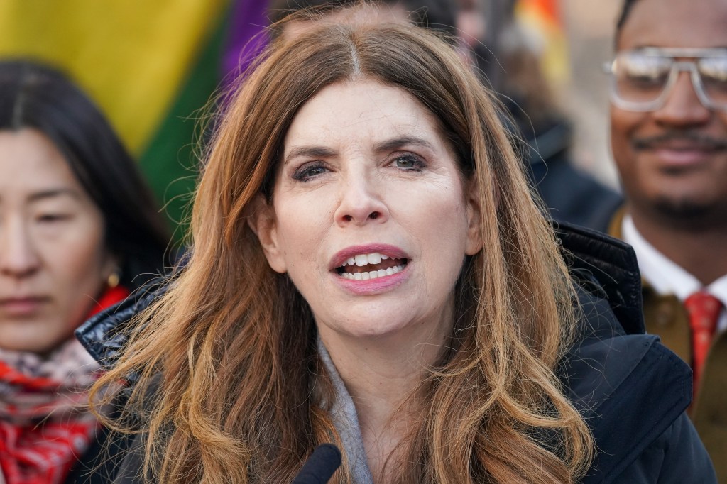Council Speaker Julie Menin speaking at a rally.