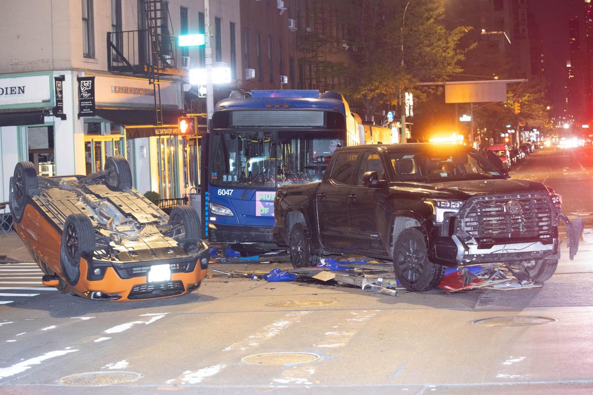 Out-of-control MTA bus plows into NYC bistro outdoor seating, overturns parked car in wild crash