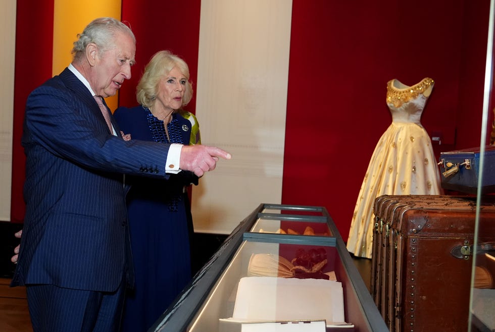 King Charles III And Queen Camilla Visit "Queen Elizabeth II: Her Life in Style" Exhibition