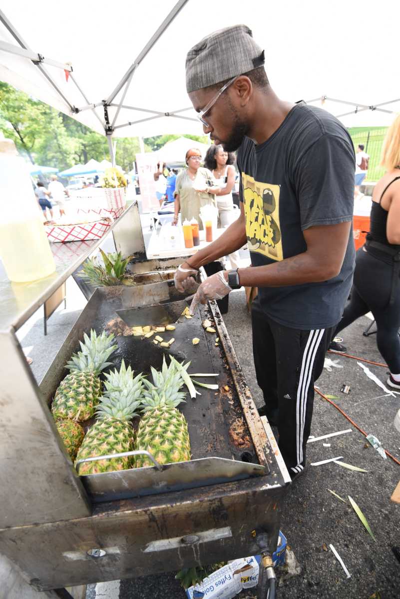 Chef Tonay cooking on the grill.