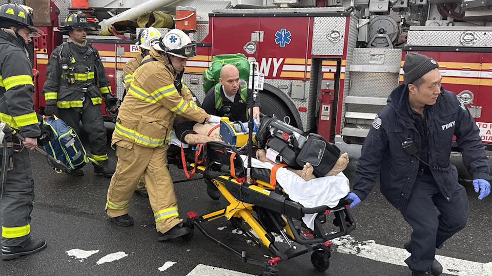 Victim being wheeled on stretcher