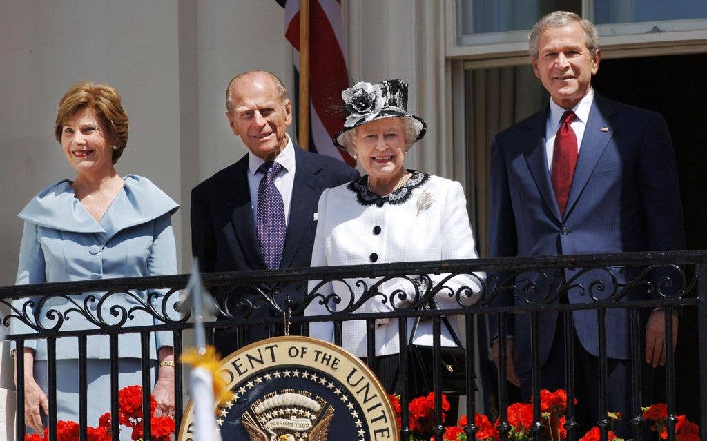 Queen Elizabeth II and the President of the United States of America George W. Bush are accompanied by their spouses, Prince Philip, Duke of Edinburgh and Laura Bush, on the balcony of the White House, Washington DC, on May 7, 2007. (Photo by Anwar Hussein/WireImage)