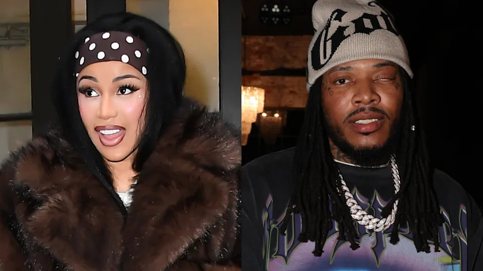 Cardi B in a fur coat and polka dot headband smiles, while Fetty Wap in a knit hat and chains poses with one eye closed.