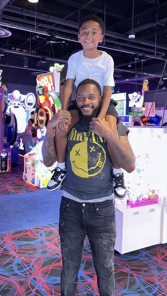 Demetri McKay Jr. with his 8-year-old son Cameron. 