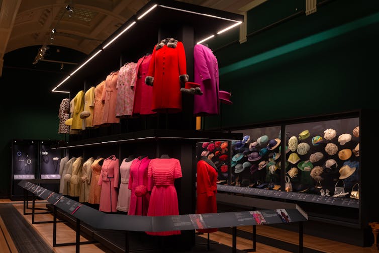 A colourful array of thats and coats at an exhibition.