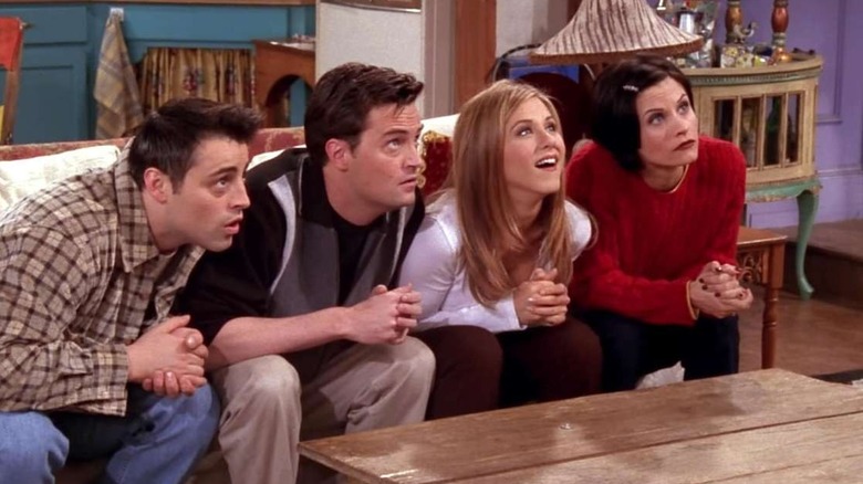 Joey, Chandler, Rachel, and Monica sitting on a couch in Friends