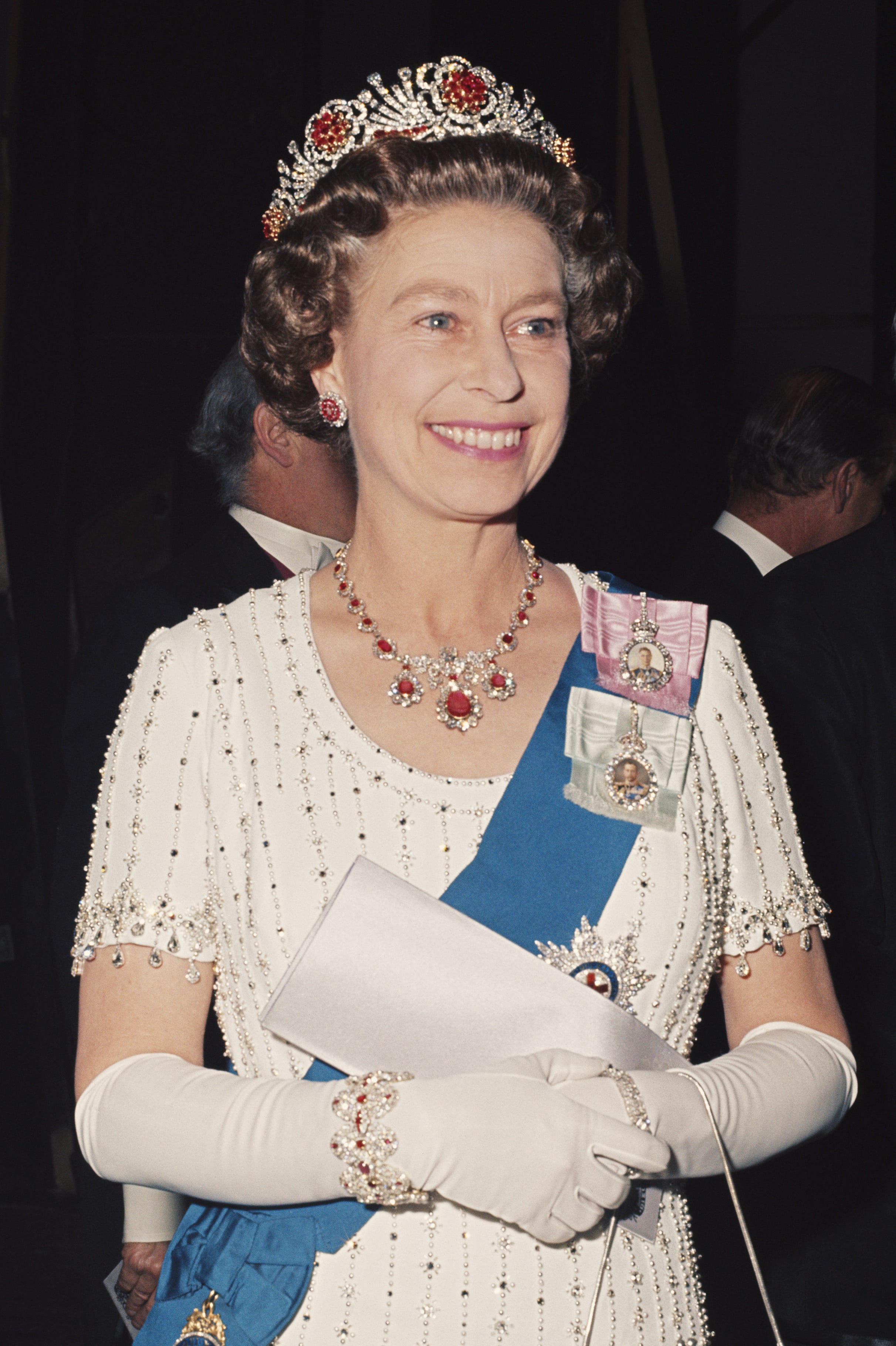 Headpiece, Event, Fashion, Hair accessory, Tradition, Tiara, Headgear, Fashion accessory, Jewellery, Performance, 