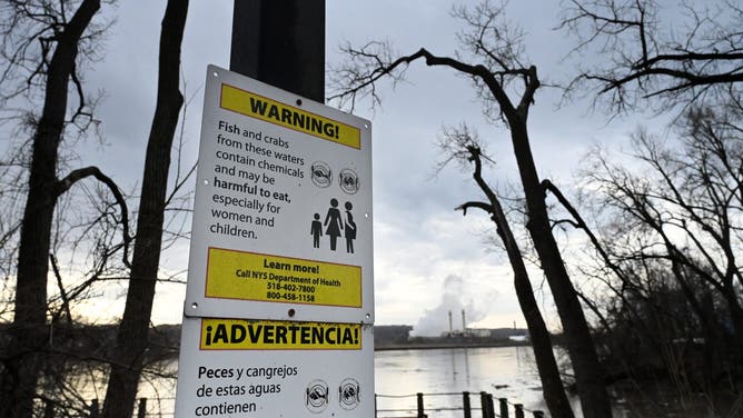 FORT EDWARD, NY - MARCH 11: Signs warning anglers that fish caught in the Hudson River are potentially harmful to consume are posted at Island Creek Park on Wednesday, March 11, 2026, in Albany, N.Y.